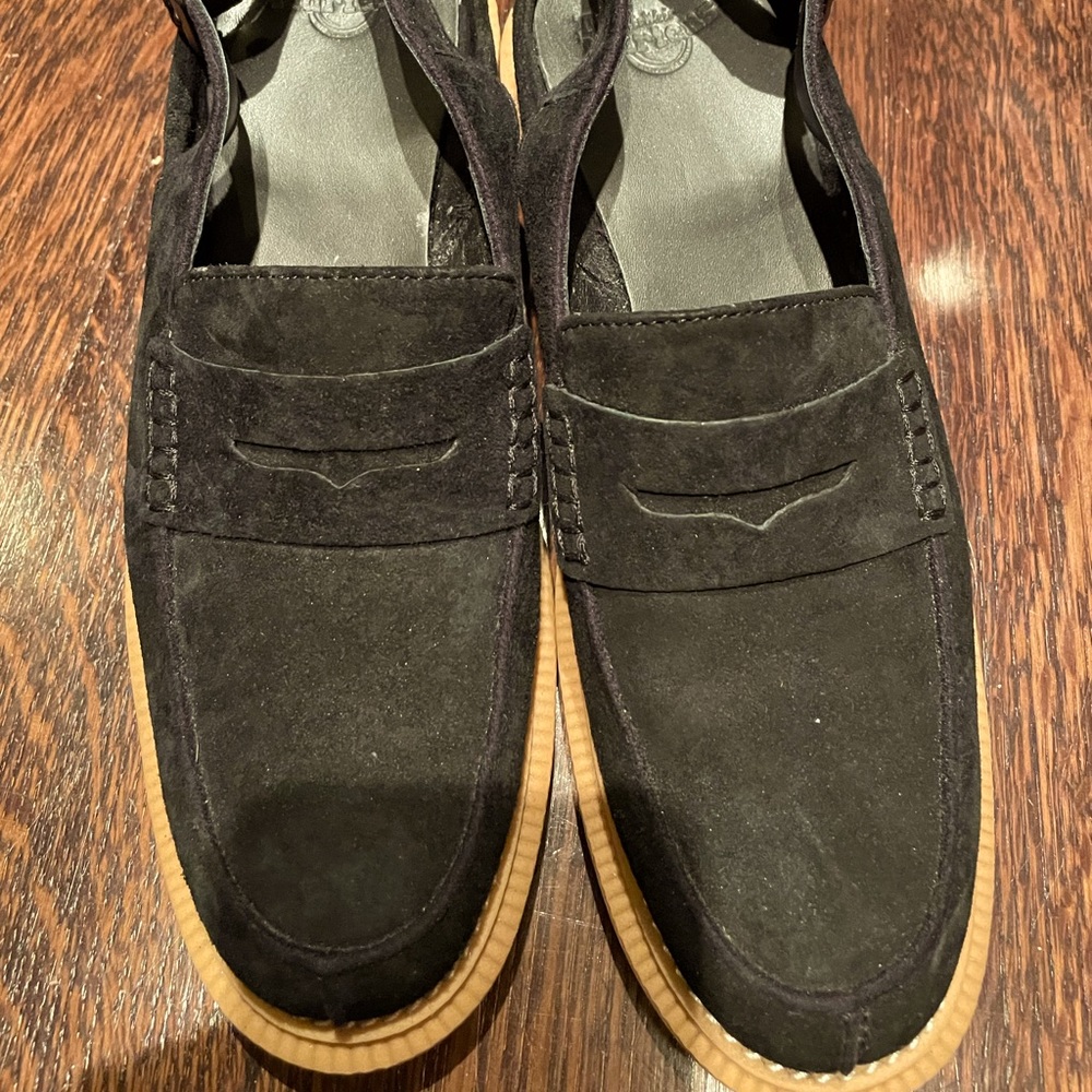 Dr. Martens sling back loafers.
